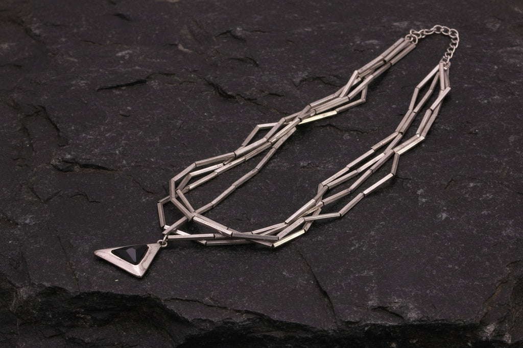 Black triangle pendant necklace