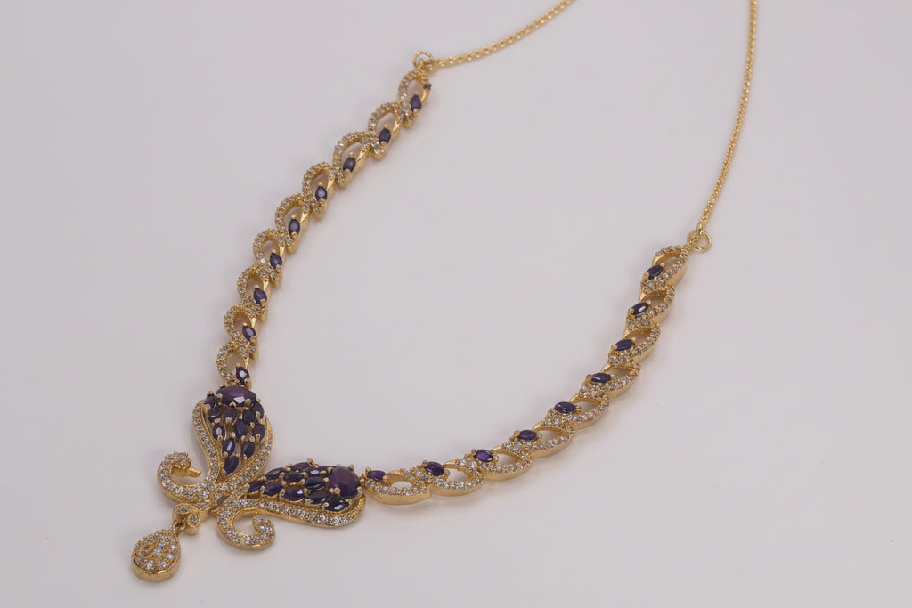 Golden necklace set with Blue stones and diamond