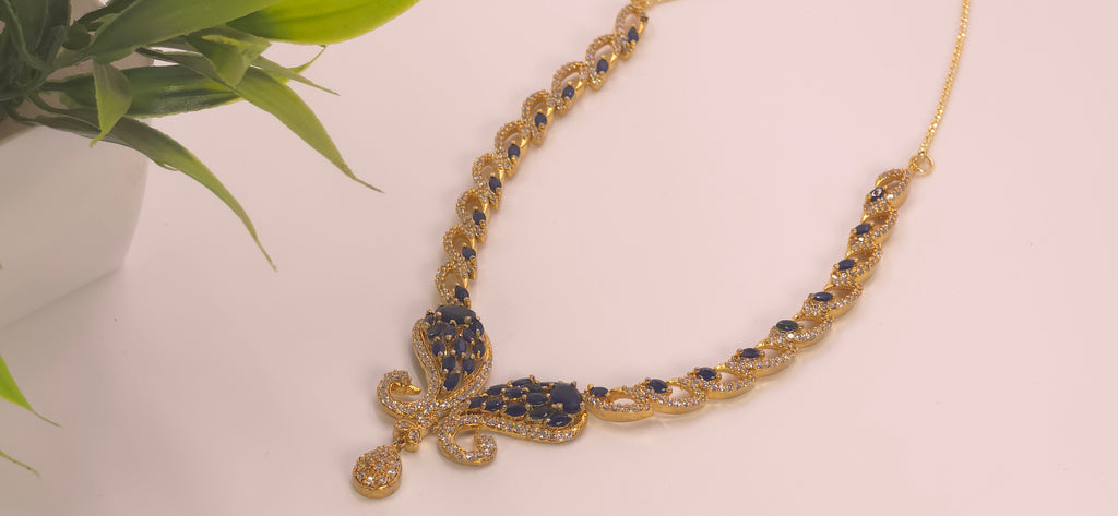 Golden necklace set with Blue stones and diamond