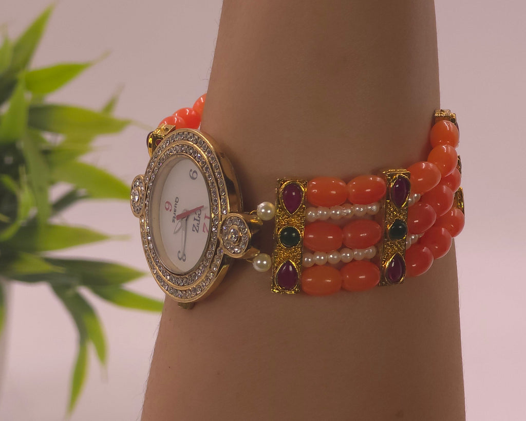 Watch with orange beads